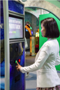 Image of guest taking photo at capture point.